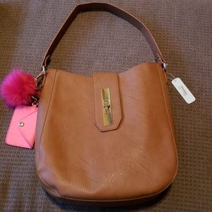 Charming Charlie's Tan bag